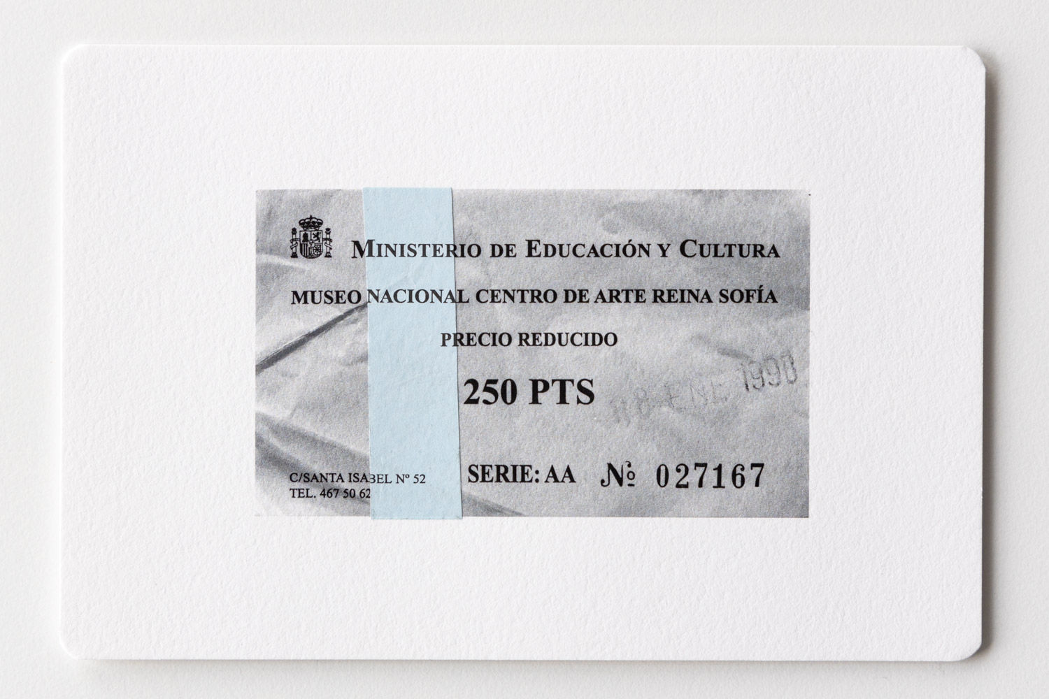 Postcard with a b/w-print of an admission ticket and a blue paper strip of the original ticket glued on.