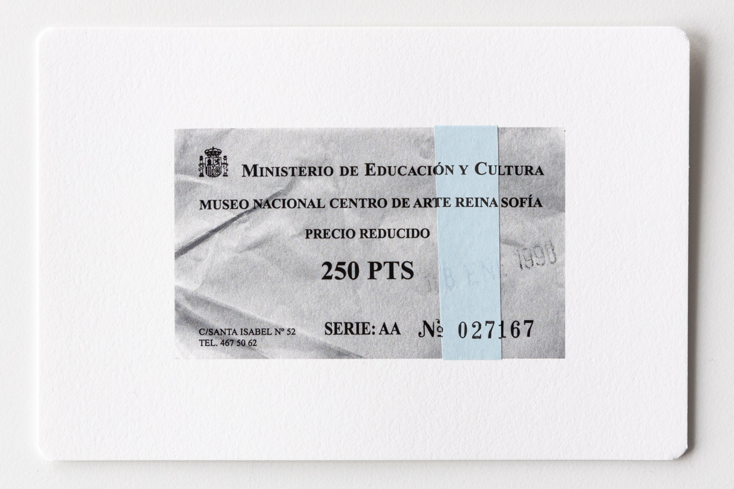 Postcard with a b/w-print of an admission ticket and a blue paper strip of the original ticket glued on.