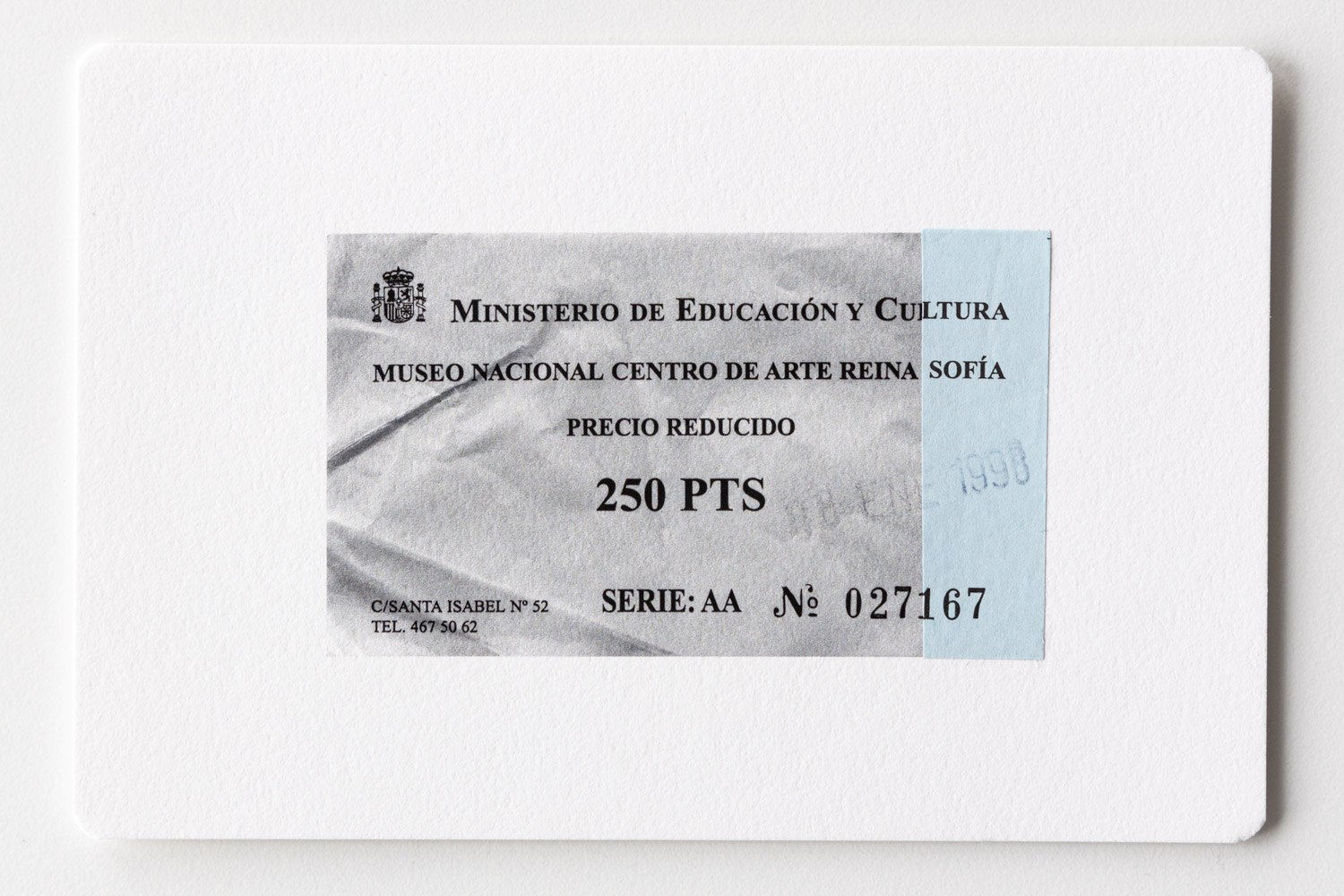 Postcard with a b/w-print of an admission ticket and a blue paper strip of the original ticket glued on.