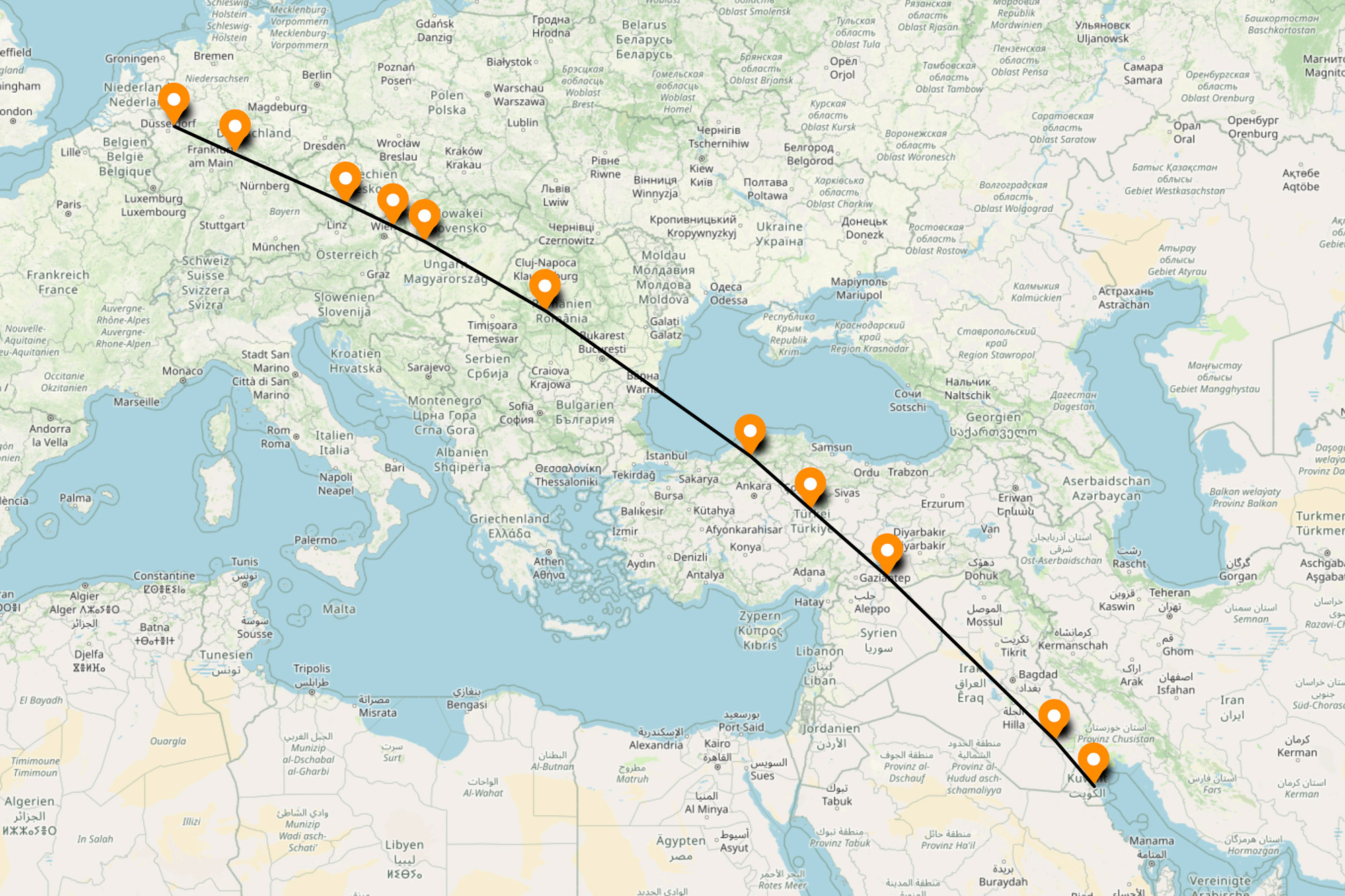 An image of an OpenStreetMap with 11 orange location marks along a straight line from Essen, Germany to Kuwait City, Kuwait.